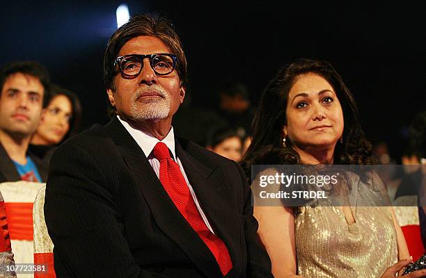Indian Bollywood actor Amitabh Bachchan and Bollywood actress Tina Munim attend the "Big Star Entertainment Awards" ceremony in Mumbai on December...