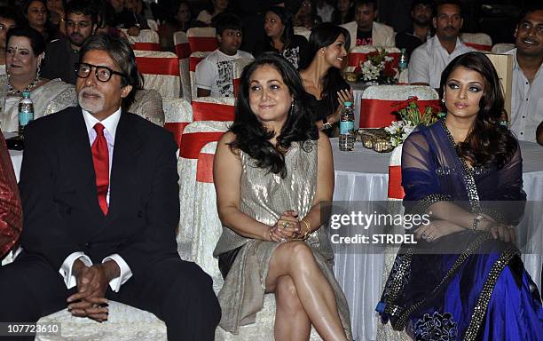 Indian Bollywood actor Amitabh Bachchan , his daughter in law and actress Aishwarya Rai Bachchan and Bollywood actress Tina Munim attend the "Big...