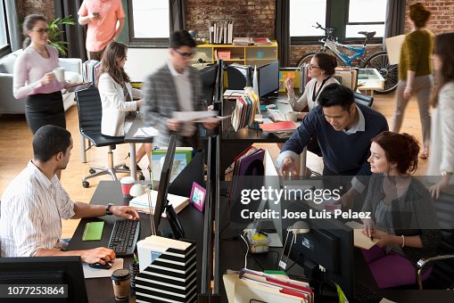Group of business people working in the office Group of business people working in the office