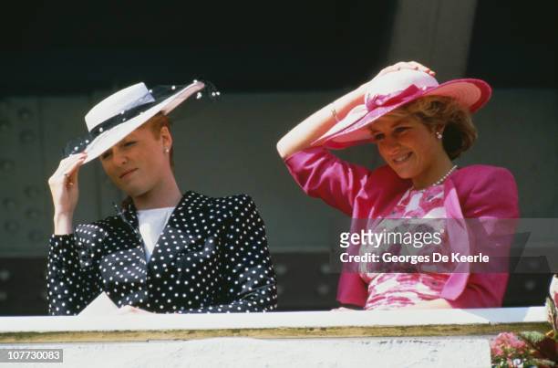 Sarah, Duchess of York and Diana, Princess of Wales at the Epsom Derby, 3rd June 1987.