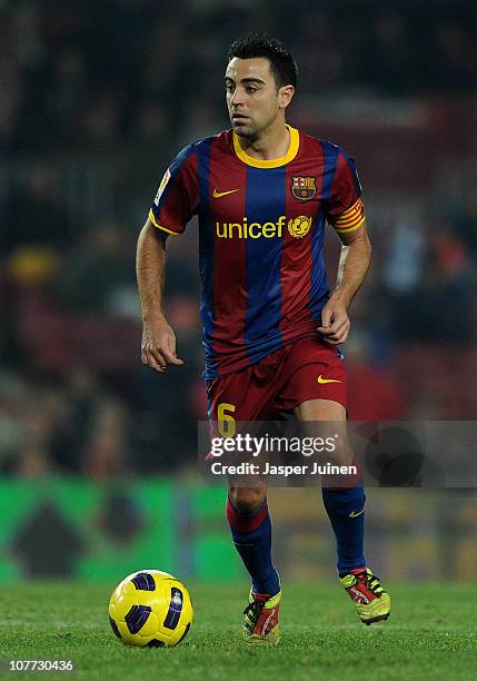 Xavi Hernandez of Barcelona controls the ball during the round of last 16 Copa del Rey match between FC Barcelona and Athletic Bilbao at the Camp Nou...