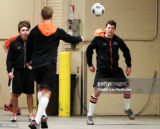 Darroll Powe of the Philadelphia Flyers plays a game of soccer prior to his game against the Florida Panthers on December 20, 2010 at the Wells Fargo...