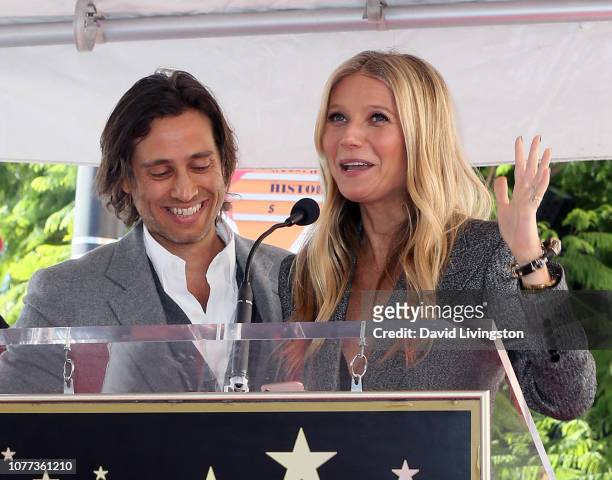 Brad Falchuk and Gwyneth Paltrow attend a ceremony honoring Ryan Murphy with a star on The Hollywood Walk of Fame on December 04, 2018 in Hollywood,...