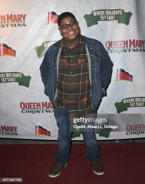 Actor Akinyele Caldwell attends the Queen Mary Christmas Media & VIP Night held on November 26, 2018 in Long Beach, California.