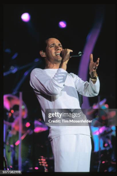 Prominent salsa singer Marc Anthony, sings into the microphone during his performance at Shoreline Amphitheater in California.