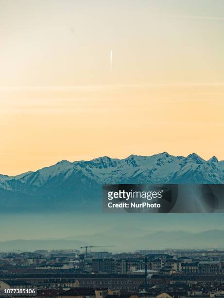 The heavy air pollution and smog is seen in front of the alps, on January 4, 2019. View from the Monte dei Cappuccini on the capital of the Northern...
