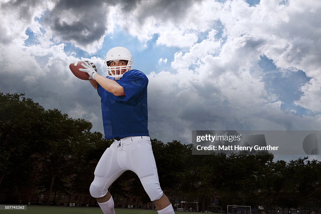 Football player ready to throw football