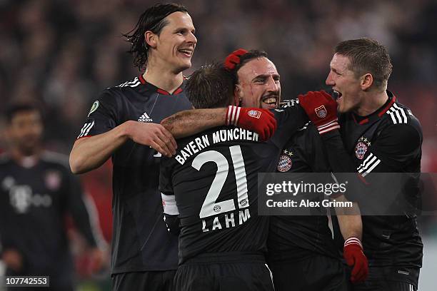 Franck Ribery of Muenchen celebrates his team's sixth goal with team mates Daniel van Buyten, Philipp Lahm and Bastian Schweinsteiger during the DFB...