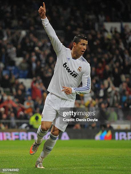 Cristiano Ronaldo of Real Madrid celebrates after scoring his first goal against Levante during the first leg round of 16 Copa del Rey match between...