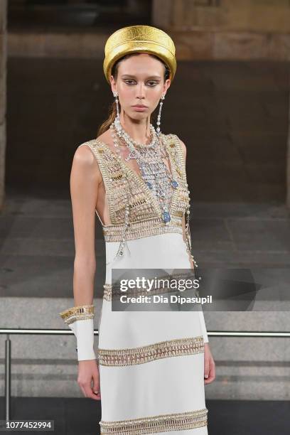 Model walks the runway at Chanel Metiers D'Art 2018/19 Show at The Metropolitan Museum of Art on December 04, 2018 in New York City.