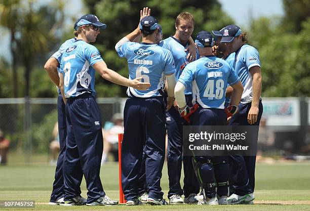 Michael Bates of the Aces celebrates his dismissal of Shahid Afridi of Pakistan during the Twenty20 trial match between Pakistan and the Auckland...