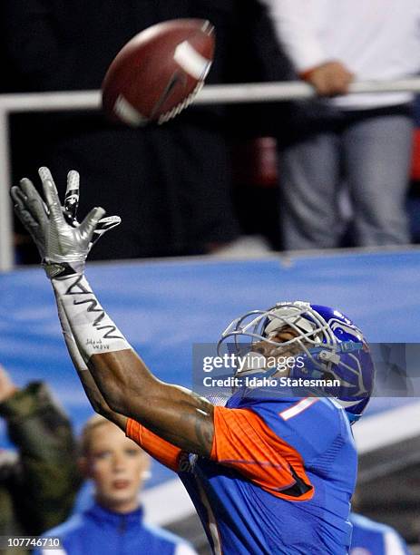 Boise State wide receiver Titus Young hauls in a pass amid the Broncos' 26-3 victory over Utah in the MAACO Las Vegas Bowl in Las Vegas, Nevada, on...