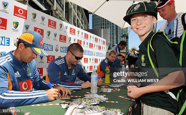 Australian captain Ricky Ponting and vice-captain Michael Clarke sign autographs for fans during a public appearance of the Australian and England...