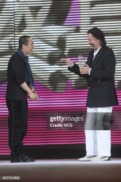 Chinese director Zhang Yimou delivers "Lifetime Achievement Award" to German designer Luigi Colani during China Fashion Ceremony 2010 at Traders...