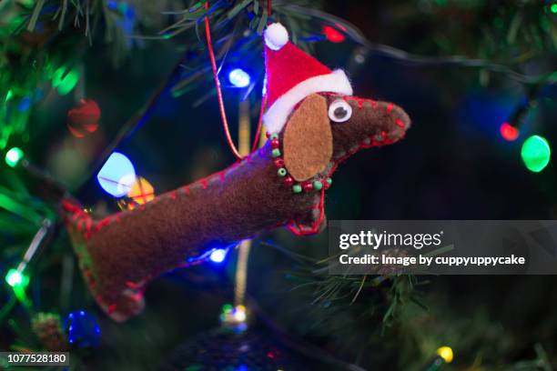 felt dachshund christmas ornament - dachshund holiday stock pictures, royalty-free photos & images