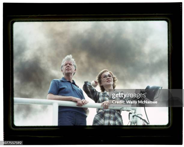 President Jimmy Carter and his wife Rosalynn look out from the deck of the Delta Queen riverboat. The couple vacationed by sailing down the...