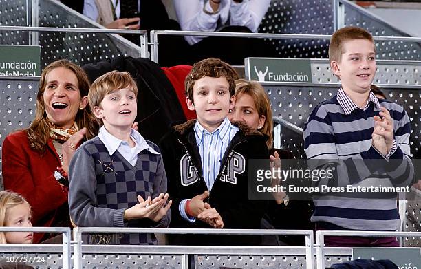 Princess Elena and Princess Cristina and kids attend Rafael Nadal and Roger Federer's charity match at La Caja Magica on December 22, 2010 in Madrid,...
