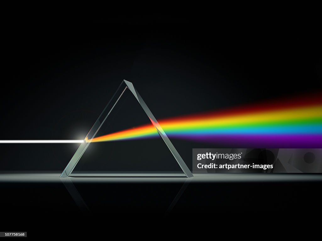 Prism splitting light into color spectrum