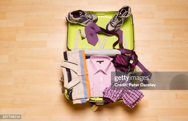 mans business suitcase from above - open suitcase stock pictures, royalty-free photos & images