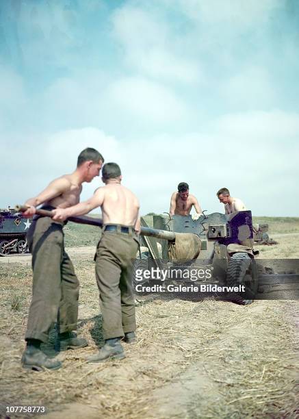 Operation Overlord Normandy, Soldiers of the 3rd Canadian Infantry Division are trying to set up an anti-aircraft gun. June 1944. The emplacement is...
