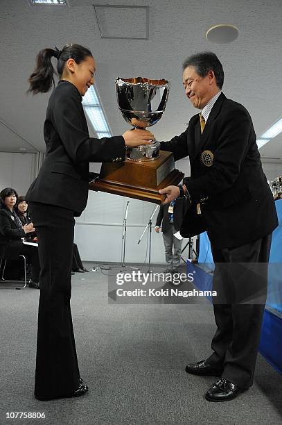 Mao Asada holds the victory cup during the opening ceremony of the Japan Figure Skating Championships 2010 at Big Hat on December 23, 2010 in Nagano,...