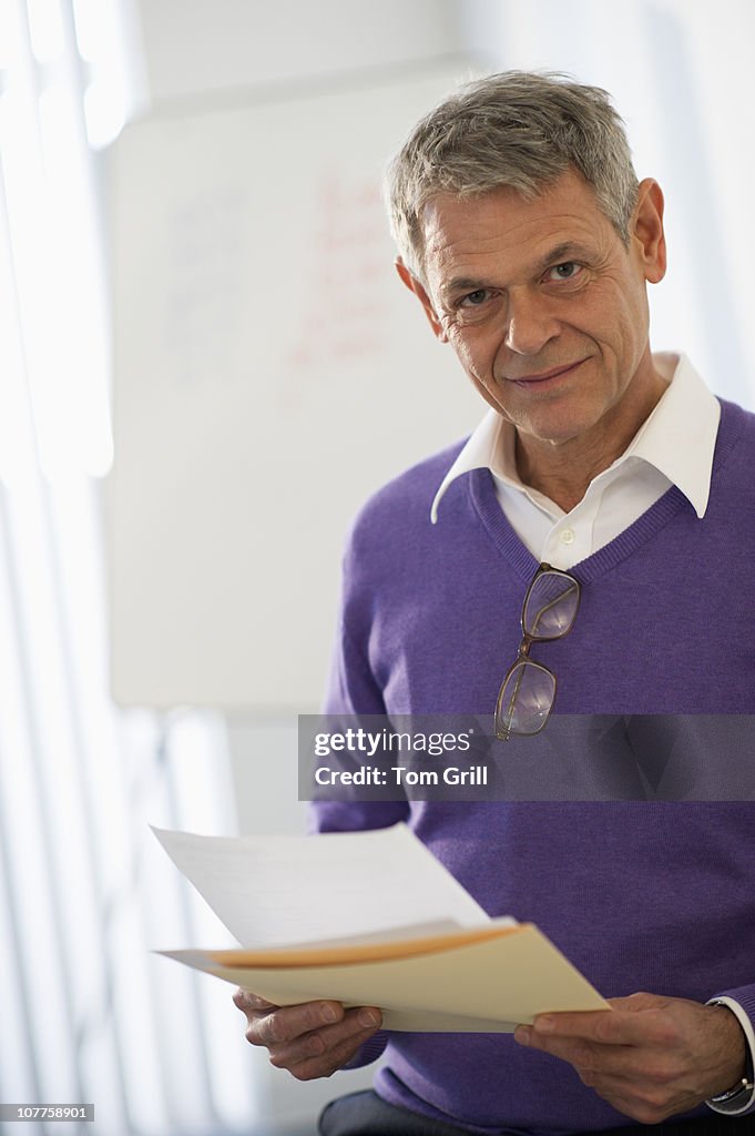 Businessman looking at papers