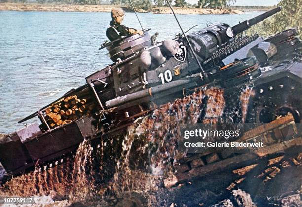 Operation Barbarossa, A tank of the SS division Das Reich has crossed a river on the Eastern Front in Russia. 1941. The division operated on the...