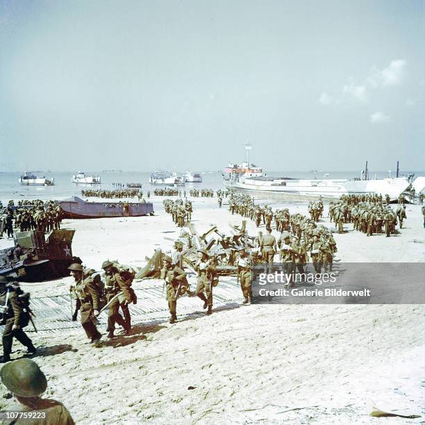 Operation Overlord Normandy, The Saskatchewan Regiment of the 2nd Canadian Infantry Division is landing at Juno Beach on the outskirts of...