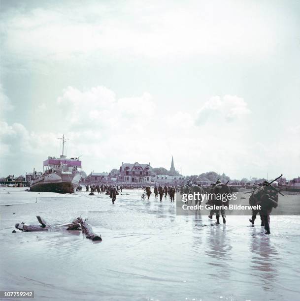 Operation Overlord Normandy, Troops of the 3rd Canadian Infantry Division are landing at Juno Beach on the outskirts of Bernieres-sur-Mer on D-Day....
