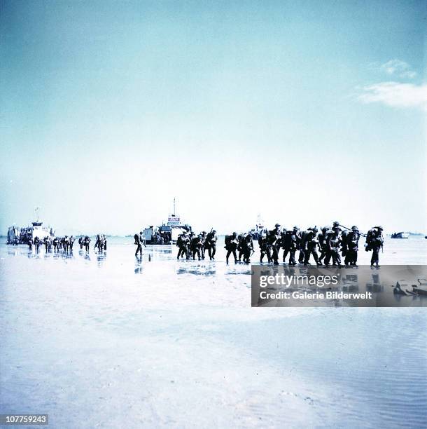 Operation Overlord Normandy, Troops of the 3rd Canadian Infantry Division are landing at Juno Beach on the outskirts of Bernieres-sur-Mer on D-Day....