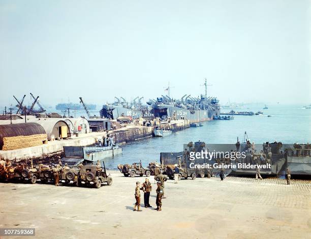 Operation Overlord, Vessels are waiting for the start of D-Day operations in an English port of embarkation. 4th June 1944. USS LST-314 departed...