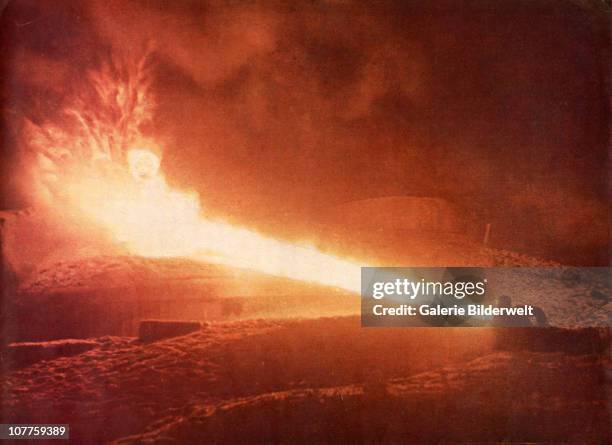 Operation Barbarossa, Wehrmacht soldiers are attacking a bunker on the Eastern Front in Russia. 1941. They are using the flamethrower 41 which was...