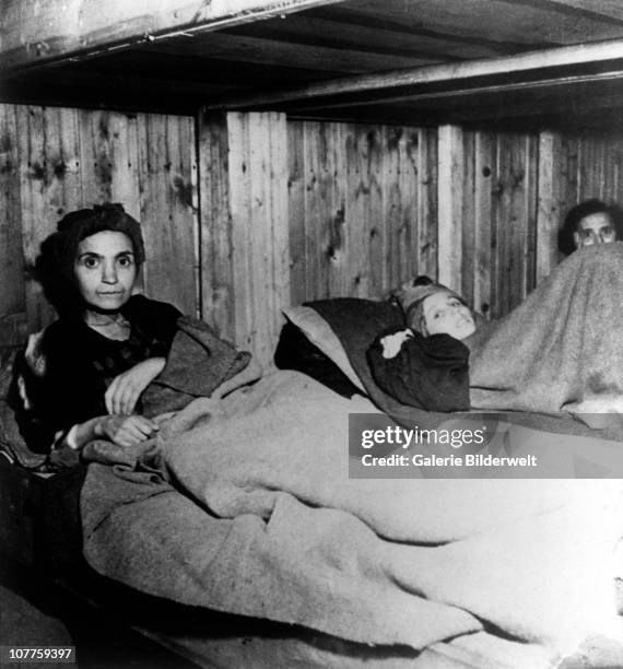 Penig Concentration Camp, Three of the 600 Jewish women from Hungary who worked in airplane factory; near Penig, a sub-camp of Buchenwald. 12th April...