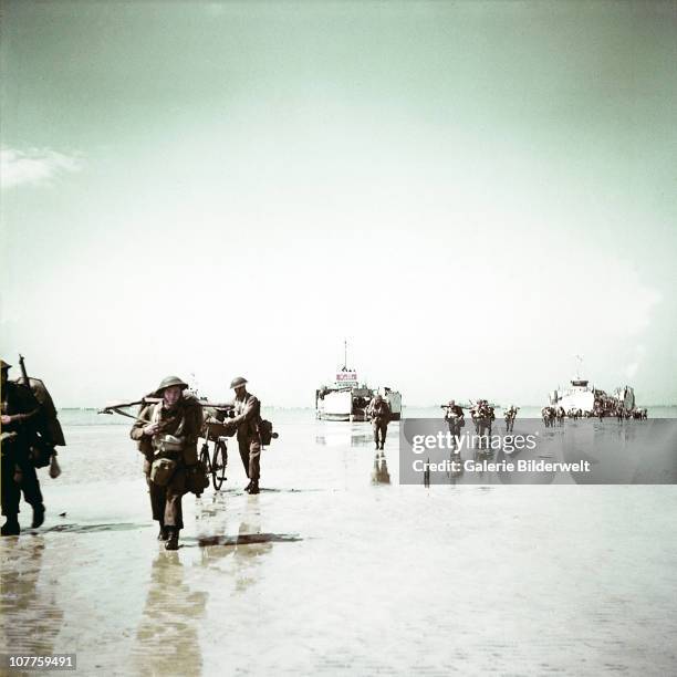 Operation Overlord Normandy, Troops of the 3rd Canadian Infantry Division are landing at Juno Beach on the outskirts of Bernieres-sur-Mer on D-Day....