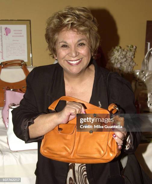 Lupe Ontiveros of "Real Women Have Curves" with a Kooba Handbag from PinkMascara.com