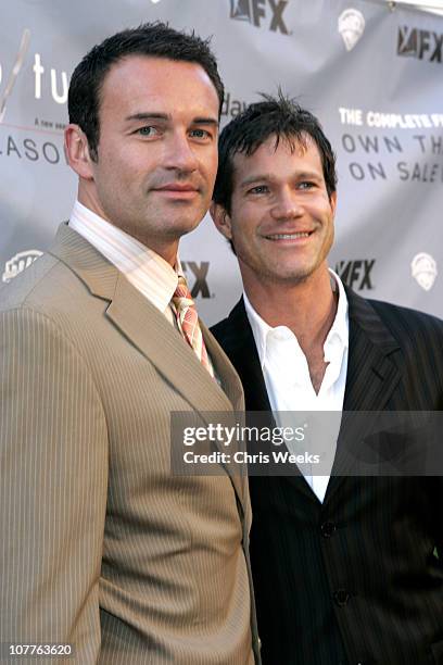 Julian McMahon and Dylan Walsh during "Nip/Tuck Season 2" Premiere - Red Carpet at Paramount Theatre in Los Angeles, California, United States.