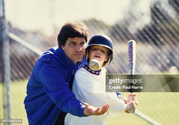 Mark Spitz teaches his son Matthew how to hit a baseball and attends a softball match, Mark Spitz is trying to get in shape for the 1992 Olympics May...