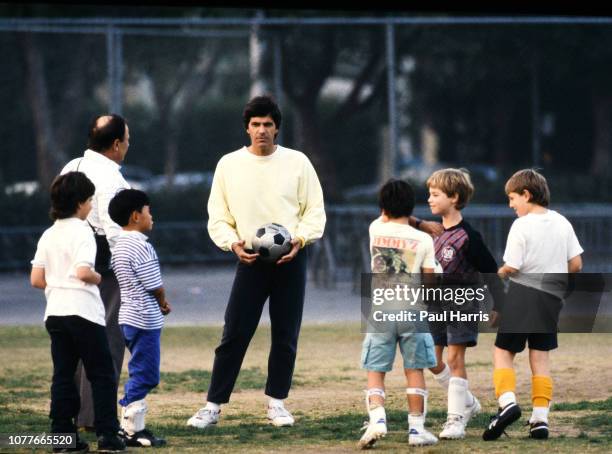 Mark Spitz and son Matthew attend a soccer training session, Mark Spitz is trying to get in shape for the 1992 Olympics May 17, 1990 Pacific...
