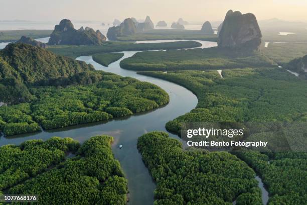 unseen thailand : aerial view of phang nga bay in the sunset, thailand - brume riviere photos et images de collection