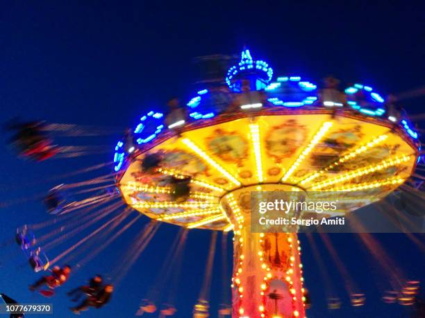 swing ride at funfair - spinning stock pictures, royalty-free photos & images