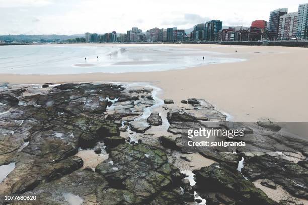 general view of san lorenzo beach in the city of gijon - beach club stock pictures, royalty-free photos & images