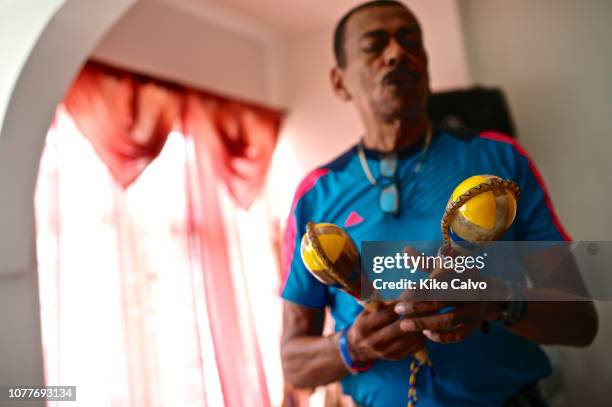 Portrait of Conga and Bongo music master Ovidio Quinonez, locally known as Billo, in his home and workshop.