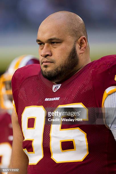 Ma'ake Kemoeatu of the Washington Redskins warms up before a game against the Dallas Cowboys at Cowboys Stadium on December 19, 2010 in Arlington,...