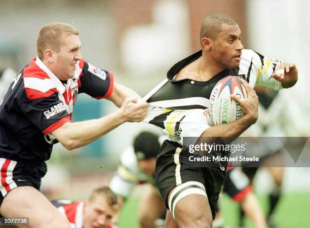 Fiji's Waisale Sovatabua escapes Russia's Matthew Donovan in the Group One match between Fiji v Russia at Craven Park, Barrow. Mandatory...