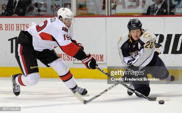 Ryan Suter of the Nashville Predators ties up Jason Spezza of the Ottawa Senators on December 23, 2010 at the Bridgestone Arena in Nashville,...