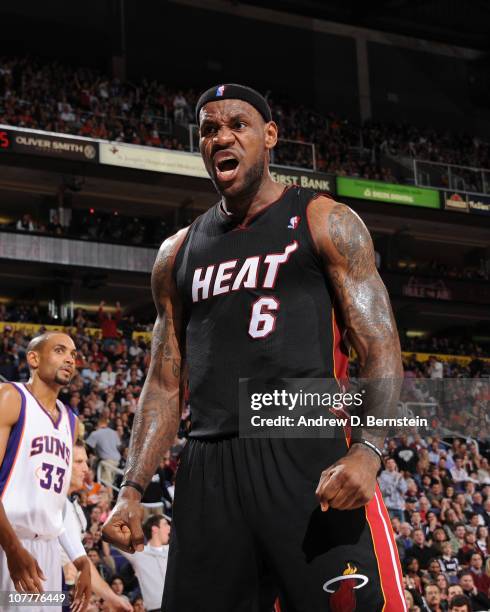 LeBron James of the Miami Heat celebrates a basket against the Phoenix Suns in an NBA game played on December 23, 2010 at U.S. Airways Center in...