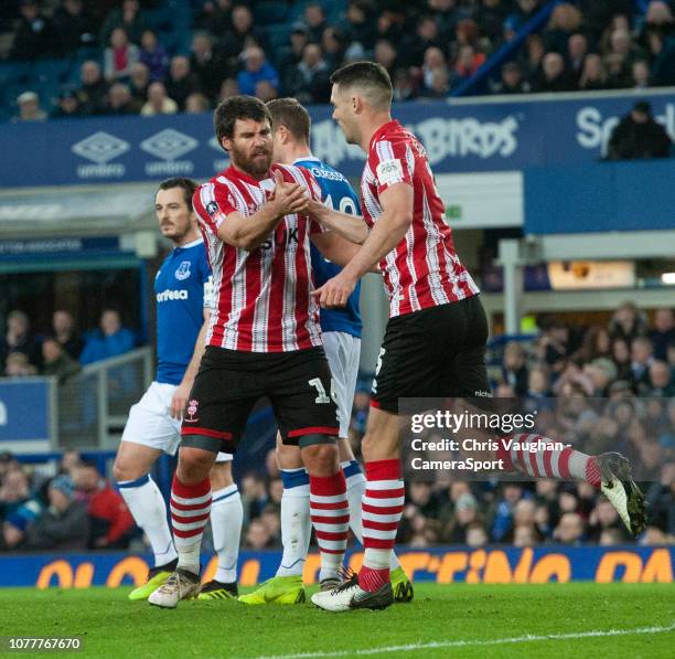 Lincoln City's Michael Bostwick, left, celebrates scoring his side's first goal with team-mate Jason Shackell during the FA Cup Third Round match...