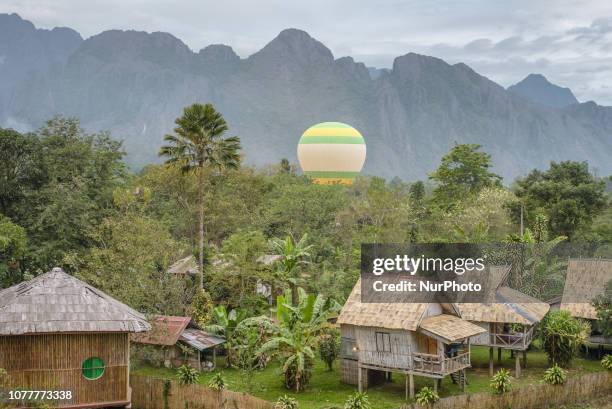 The view of Vang Vieng, Laos, in December 2018. Since the end of the 90s, Vang Vieng has been opened as a tourist site for western backpackers. The...