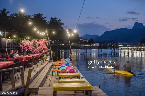 The view of Vang Vieng, Laos, in December 2018. Since the end of the 90s, Vang Vieng has been opened as a tourist site for western backpackers. The...