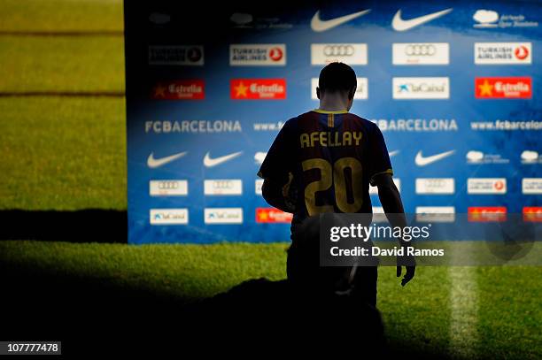 New signing Ibrahim Afellay goes into the stadium during his presentation as new FC Barcelona player at Camp Nou on December 24, 2010 in Barcelona,...